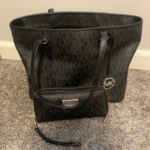Michael Kors tote with matching wallet.